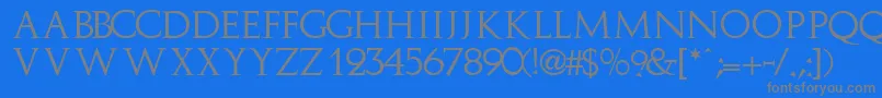 Fonte ImplicitcapssskRegular – fontes cinzas em um fundo azul
