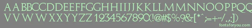 フォントImplicitcapssskRegular – 灰色の背景に緑のフォント
