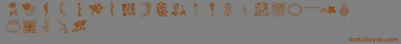 フォントLpflowers – 茶色の文字が灰色の背景にあります。