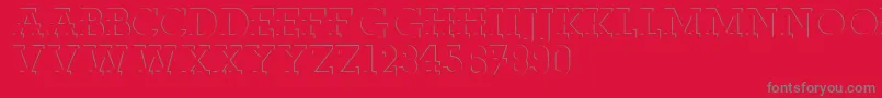 Reliefdeco Font – Gray Fonts on Red Background