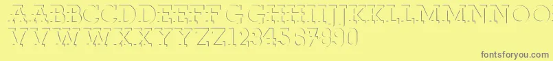 Reliefdeco Font – Gray Fonts on Yellow Background