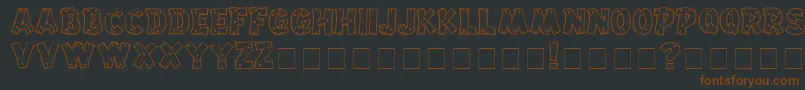 Drifttype-fontti – ruskeat fontit mustalla taustalla