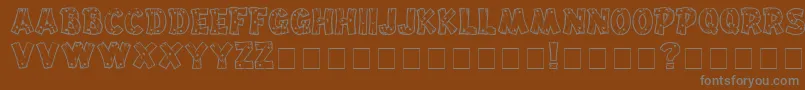 Шрифт Drifttype – серые шрифты на коричневом фоне