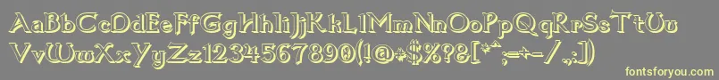 Шрифт Dumbledor1Shadow – жёлтые шрифты на сером фоне