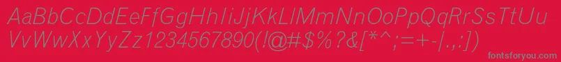 フォントGrotesquemtstdLightitalic – 赤い背景に灰色の文字