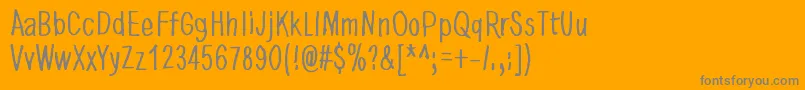 フォントDancingInTheDark – オレンジの背景に灰色の文字