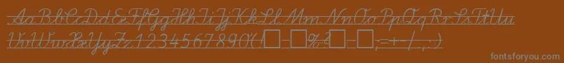 LaE2-fontti – harmaat kirjasimet ruskealla taustalla