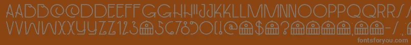 DkPaviljoen-Schriftart – Graue Schriften auf braunem Hintergrund