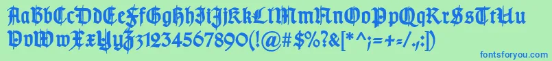 TypographergotischSchmuckBold-fontti – siniset fontit vihreällä taustalla