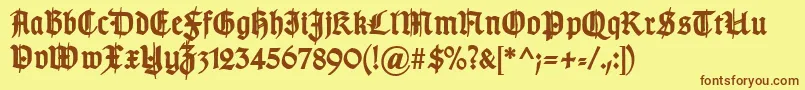TypographergotischSchmuckBold Font – Brown Fonts on Yellow Background