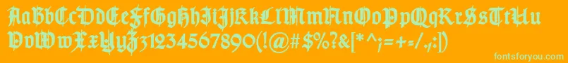 Fonte TypographergotischSchmuckBold – fontes verdes em um fundo laranja