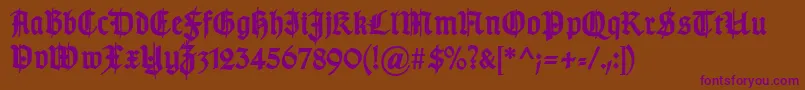 TypographergotischSchmuckBold-Schriftart – Violette Schriften auf braunem Hintergrund