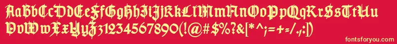 TypographergotischSchmuckBold-Schriftart – Gelbe Schriften auf rotem Hintergrund