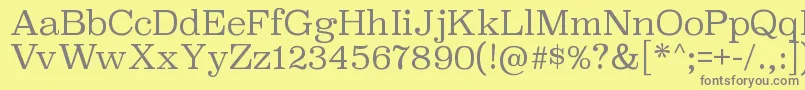 フォントSuperclarendonltRegular – 黄色の背景に灰色の文字