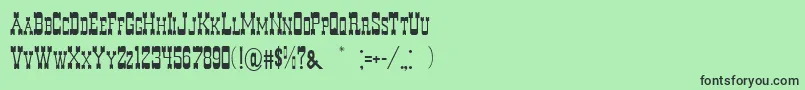 DecreeArtOne Font – Black Fonts on Green Background