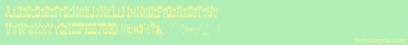 フォントDecreeArtOne – 黄色の文字が緑の背景にあります