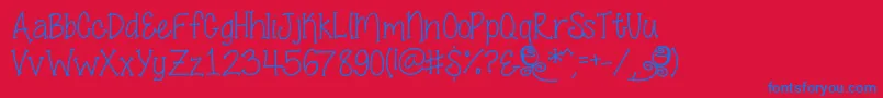 SmellTheRoses Font – Blue Fonts on Red Background