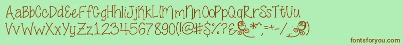 SmellTheRoses-fontti – ruskeat fontit vihreällä taustalla
