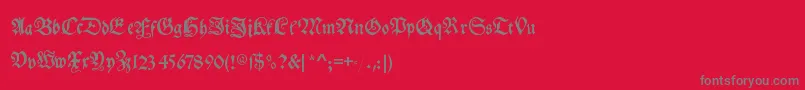 フォントMyelectronicschwabach – 赤い背景に灰色の文字