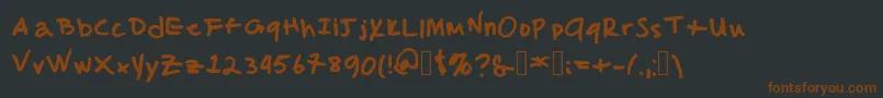 MalcolmsHandwriting Font – Brown Fonts on Black Background