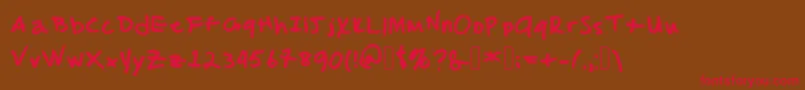 フォントMalcolmsHandwriting – 赤い文字が茶色の背景にあります。