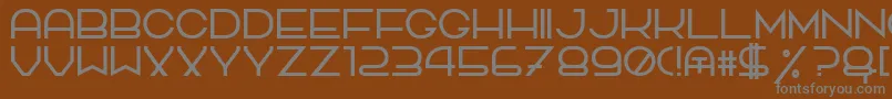 TpfQuackery Font – Gray Fonts on Brown Background