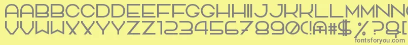 フォントTpfQuackery – 黄色の背景に灰色の文字