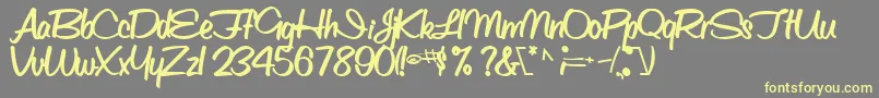 ObettescriptsskBold Font – Yellow Fonts on Gray Background