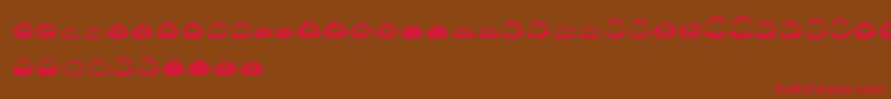 KissKissTtf Font – Red Fonts on Brown Background