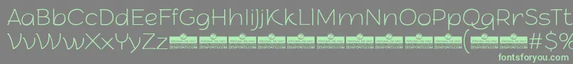 ArturoThinTrial Font – Green Fonts on Gray Background