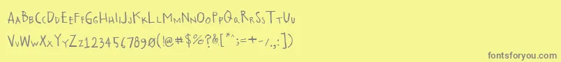 フォントTf2professor – 黄色の背景に灰色の文字