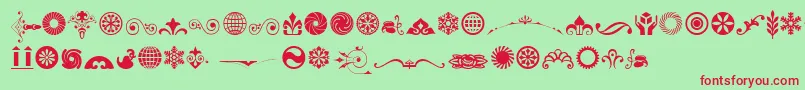 Fonte CornucopiaOfOrnamentsThree – fontes vermelhas em um fundo verde