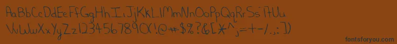 Lehn202 Font – Black Fonts on Brown Background