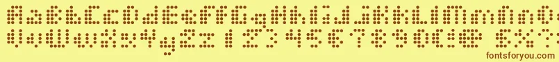 フォントDotShortOfAMatrix – 茶色の文字が黄色の背景にあります。