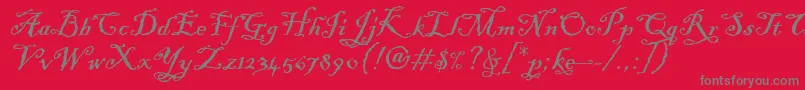 BlackadderItcTt-Schriftart – Graue Schriften auf rotem Hintergrund