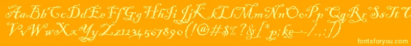 Шрифт BlackadderItcTt – жёлтые шрифты на оранжевом фоне