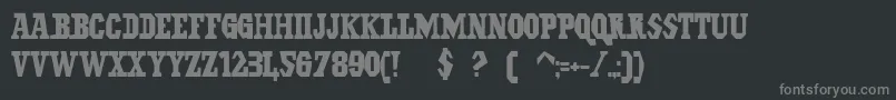 IlGrinta-fontti – harmaat kirjasimet mustalla taustalla