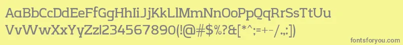 CreativzooSerifV2.1-fontti – harmaat kirjasimet keltaisella taustalla