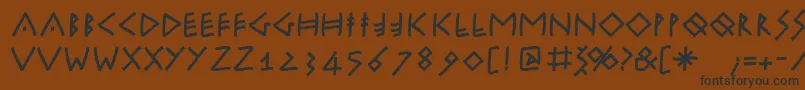 Шрифт Runikleinfreeform – чёрные шрифты на коричневом фоне