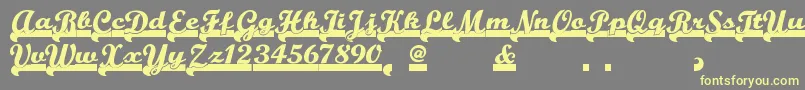 Teamspiritnf-fontti – keltaiset fontit harmaalla taustalla