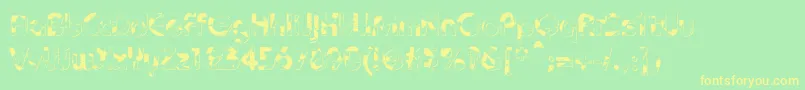 フォントBaudotShatterDb – 黄色の文字が緑の背景にあります