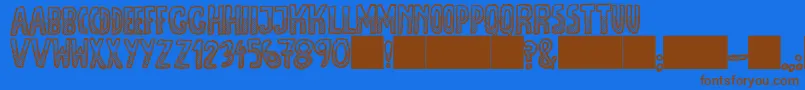 Шрифт JmhEscamasWhiteDown – коричневые шрифты на синем фоне