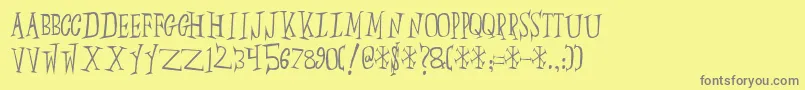 Slump-Schriftart – Graue Schriften auf gelbem Hintergrund