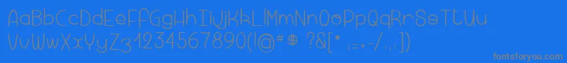 フォントMacaronicheese2 – 青い背景に灰色の文字