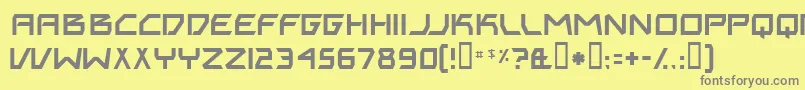 フォントBitingMyNails – 黄色の背景に灰色の文字