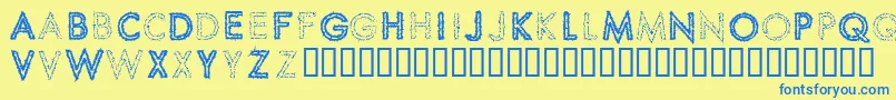 Spikcs Font – Blue Fonts on Yellow Background