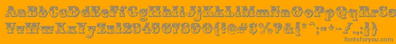 MontiDecorA-Schriftart – Graue Schriften auf orangefarbenem Hintergrund