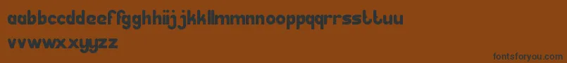 GreatLeader Font – Black Fonts on Brown Background