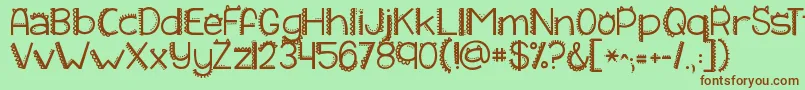 Weitere Informationen zur Kgiliketomoveit-Schriftart Kgiliketomoveit-Schriftart – Braune Schriften auf grünem Hintergrund