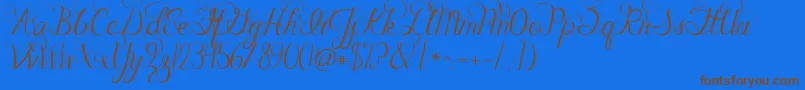 Fonte Jandacelebrationscript – fontes marrons em um fundo azul